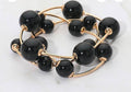 Black Ball Gold Wire Wrap Bracelet